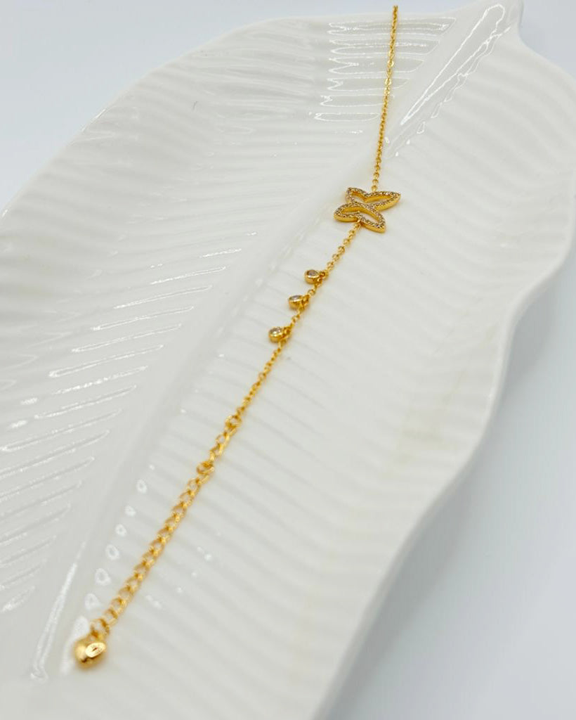 Sparkling Butterfly Bracelet in Gold Finish with Heart Drops