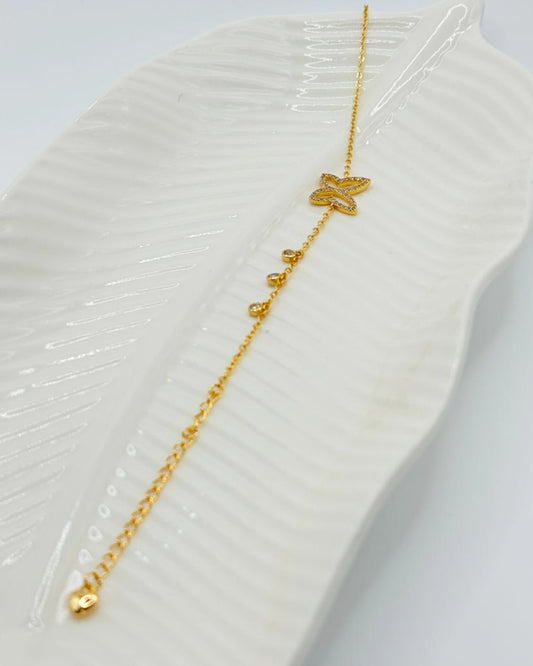 Sparkling Butterfly Bracelet in Gold Finish with Heart Drops